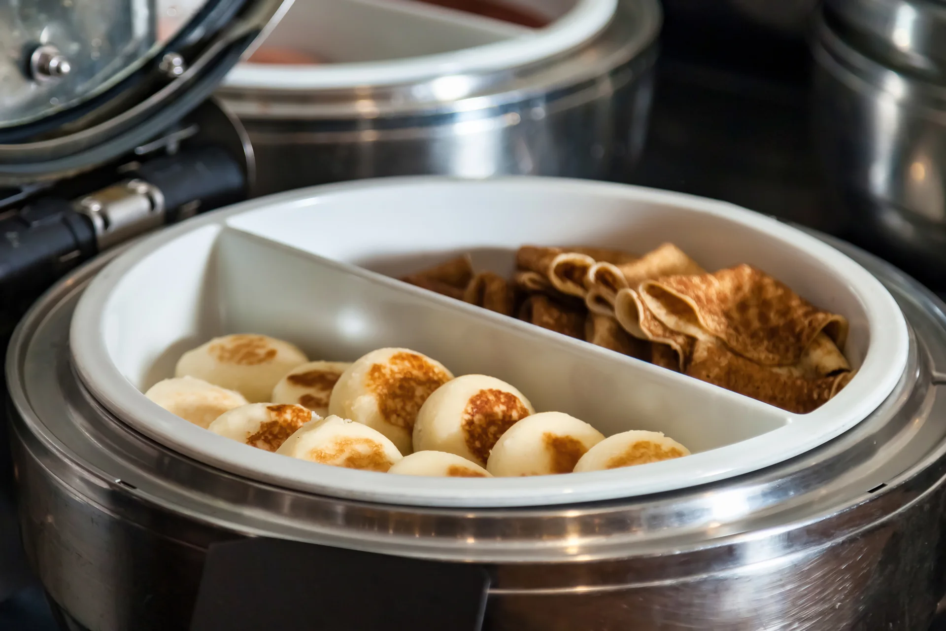 Breakfast food arranged at a buffet